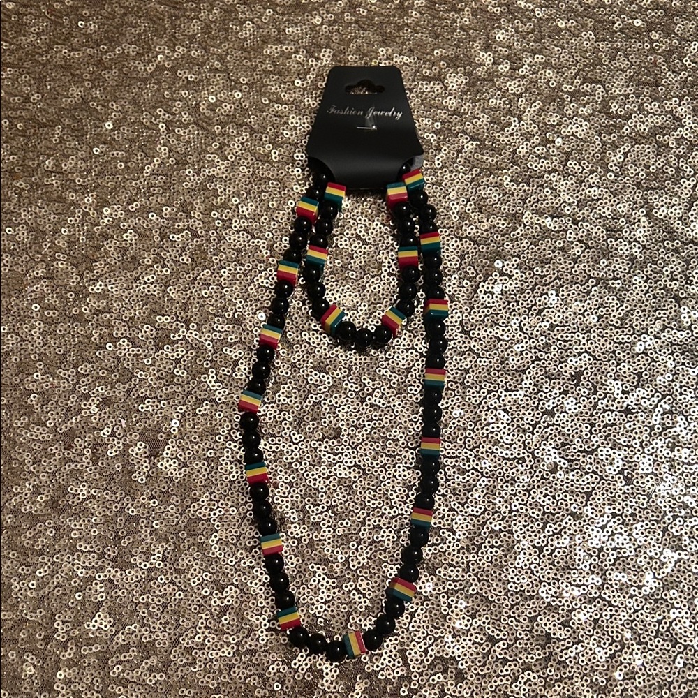 Beaded Black Necklace  and bracelet set with Red-Green-Yellow Accent Beads